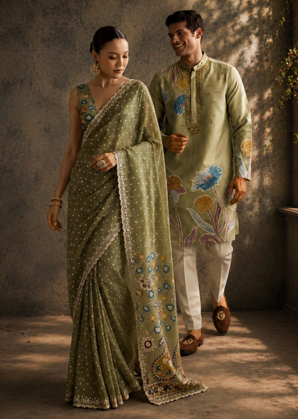 Pastel Day Couple Set – Pista Green Hand-Embroidered Muslin Saree for Her And Pastel Green Mirror Work Kurta Set for Him