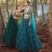 Srushti Porey In Kalki Pine Green Lehenga Choli In Raw Silk With Butti Work And Heavy Hand Embroidery In Mughal Motifs On The Choli