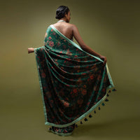 Pine Green Saree In Satin With Floral Print And Mint Sequins Blouse With Halter Neckline