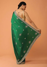 Pine Green Saree In Satin With Sequins And Zardosi Embroidered Floral Border And Butti Design Online - Kalki Fashion