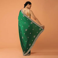 Pine Green Saree In Satin With Sequins And Zardosi Embroidered Floral Border And Butti Design Online - Kalki Fashion