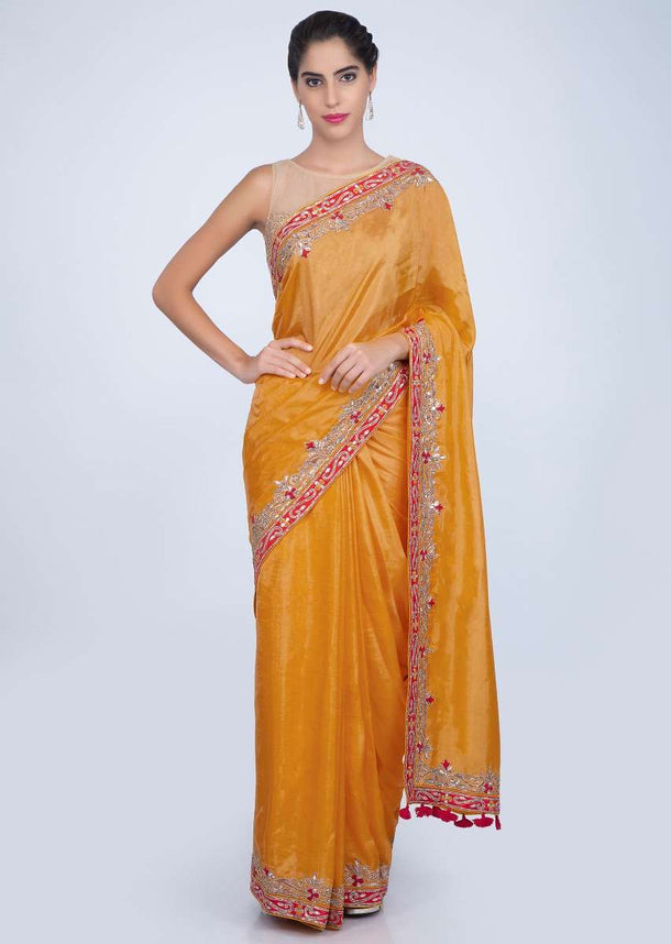 Pine yellow dupion silk saree with gotta embroidered border only on kalki