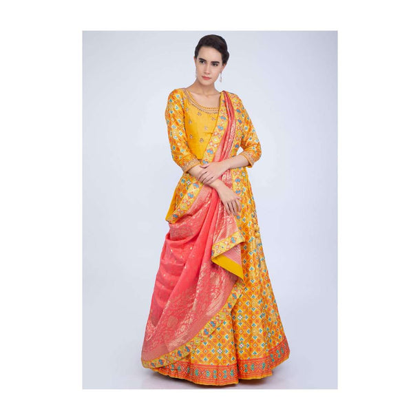 Pine Yellow Lehenga With Patola Print And Contrasting Punch Pink Weaved Dupatta Online - Kalki Fashion