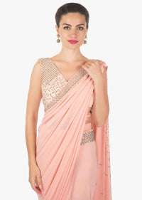 Pink ready pleated saree in lycra net embellished in kundan work