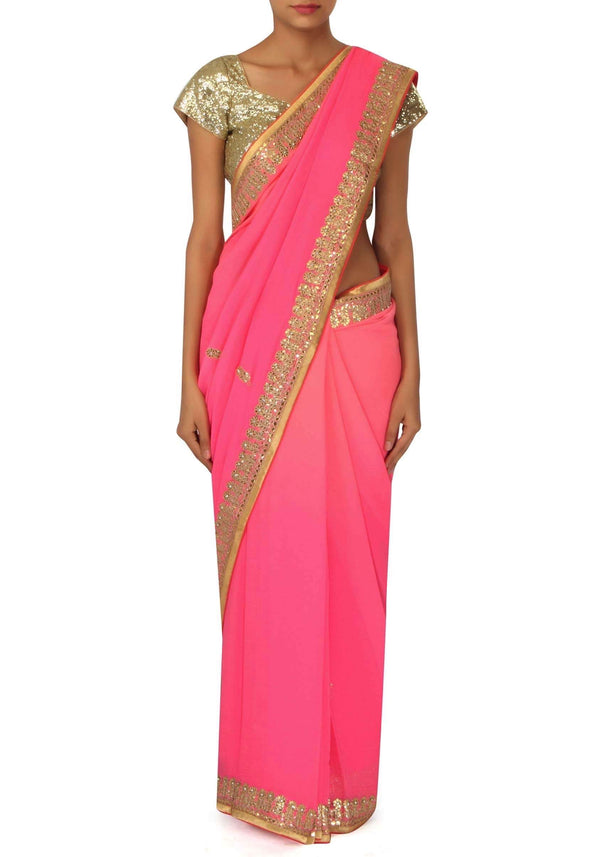 Champagne pink saree adorn in gotta patch embroidered border only on Kalki