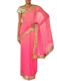 Champagne pink saree adorn in gotta patch embroidered border only on Kalki