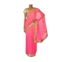 Champagne pink saree adorn in gotta patch embroidered border only on Kalki