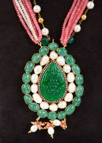 Pink shaded multi string necklace with a pearl drop shaped huge pendant in green beads only on Kalki