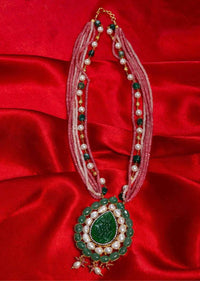 Pink shaded multi string necklace with a pearl drop shaped huge pendant in green beads only on Kalki