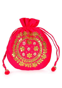 Pink velvet potli bag embellished in gotta patch and moti kalki