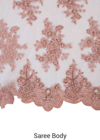 Pink embroidered net saree with scalloped border only on Kalki