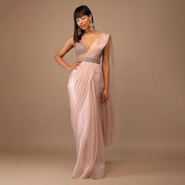 Candy Pink Organza Saree With A Heavily Embroidered Bustier And Belt