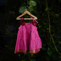 Kalki Girls Pink Tiered Dress In Cotton Silk With Adjustable Red Tie Ups On The Shoulder By Love The World Today
