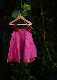 Kalki Girls Pink Tiered Dress In Cotton Silk With Adjustable Red Tie Ups On The Shoulder By Love The World Today
