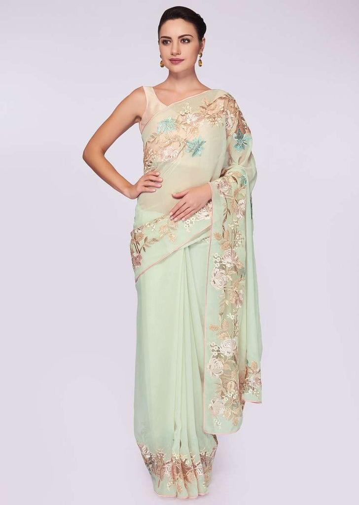 Pista green georgette saree having lower bottom in floral resham embroidery