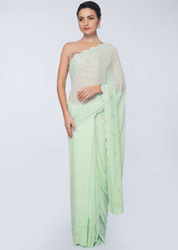 Pista green georgette saree in self thread floral embroidered border only on Kalki