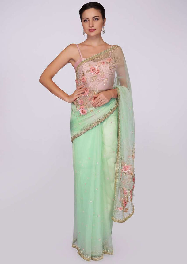 Pista green organza saree with floral embroidered pallo