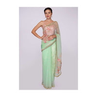 Pista green organza saree with floral embroidered pallo only on Kalki