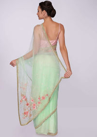 Pista green organza saree with floral embroidered pallo