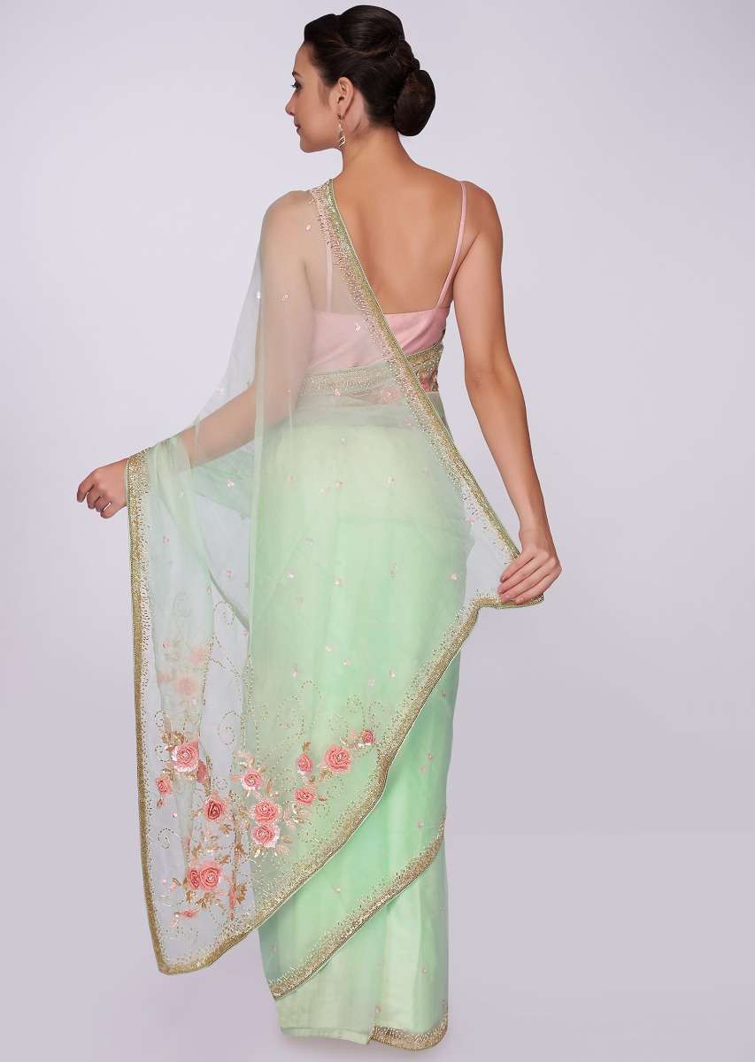 Pista green organza saree with floral embroidered pallo