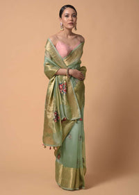 Pista Green Saree In Organza With Hand Embroidered Floral Buttis Using Thread And French Knots