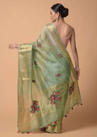 Pista Green Saree In Organza With Hand Embroidered Floral Buttis Using Thread And French Knots