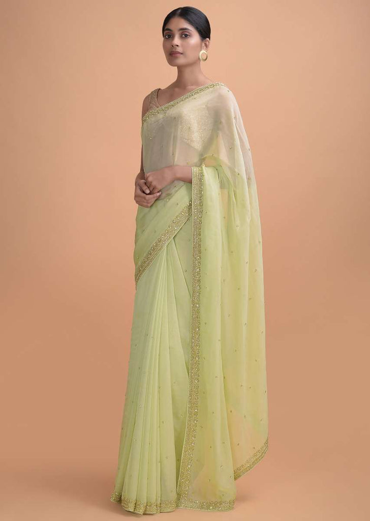 Pista Green Saree In Georgette With Embroidered Border And Buttis Online - Kalki Online