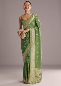 Pista Green Saree With Zari Weave And Stone Embellishments