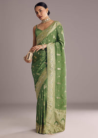 Pista Green Saree With Zari Weave And Stone Embellishments