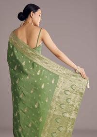 Pista Green Saree With Zari Weave And Stone Embellishments