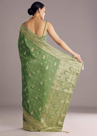 Pista Green Saree With Zari Weave And Stone Embellishments