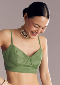 Pista Green Saree With Zari Weave And Stone Embellishments