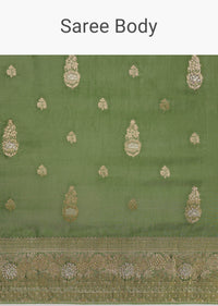Pista Green Saree With Zari Weave And Stone Embellishments