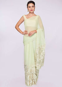 Pista green shaded georgette saree with net embroidered bottom 