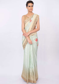 Pista green silk saree with multi color floral weaved work only on kalki