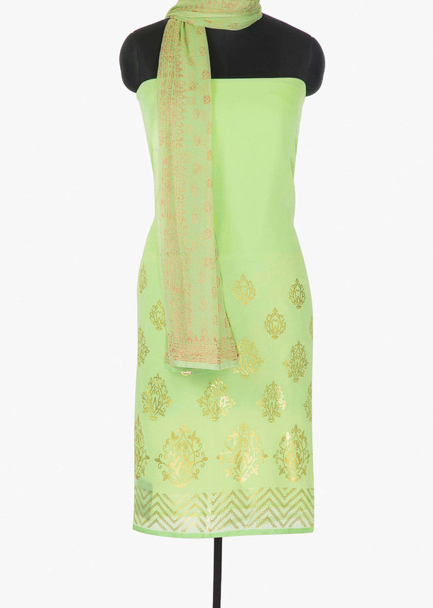 Pista green unstitched georgette suit enhanced with  foil sequin butti only on Kalki