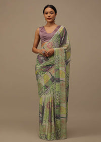 Pista Green Embroidered Muslin Saree With Floral Print And Scallop Borders