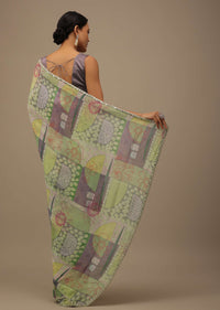 Pista Green Embroidered Muslin Saree With Floral Print And Scallop Borders