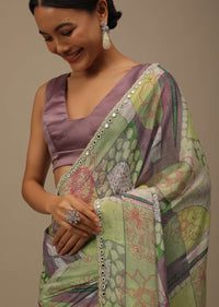 Pista Green Embroidered Muslin Saree With Floral Print And Scallop Borders