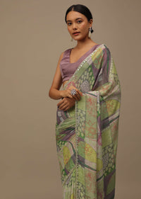 Pista Green Embroidered Muslin Saree With Floral Print And Scallop Borders