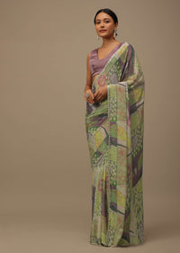 Pista Green Embroidered Muslin Saree With Floral Print And Scallop Borders