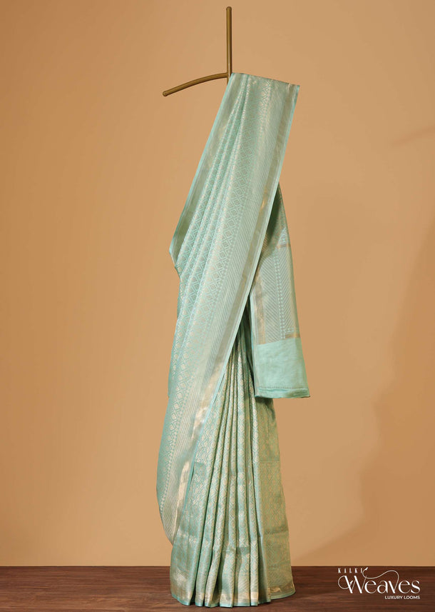 Pista Green Handloom Banarasi Saree In Satin Crepe With Gold Zari Weave And Unstitched Blouse