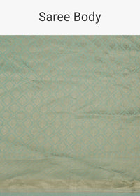 Pista Green Handloom Banarasi Saree In Satin Crepe With Gold Zari Weave And Unstitched Blouse