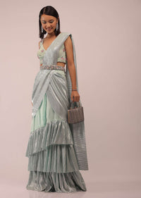 Pista Green Ready Pleated Saree With Shimmer Crepe Frill Layers And Pink Stone Studded Velvet Blouse