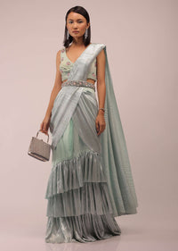 Pista Green Ready Pleated Saree With Shimmer Crepe Frill Layers And Pink Stone Studded Velvet Blouse