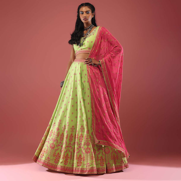 Pista Green Silk Lehenga And Blouse With Floral Print And A Well-Decorated Hem In Stone Work