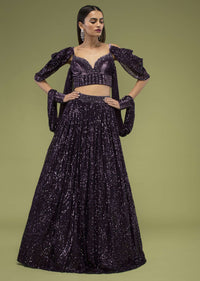 Plum Violet Lehenga And Crop Top In Velvet, Paired With A Cape Crafted In Net With Cuffs At The Border