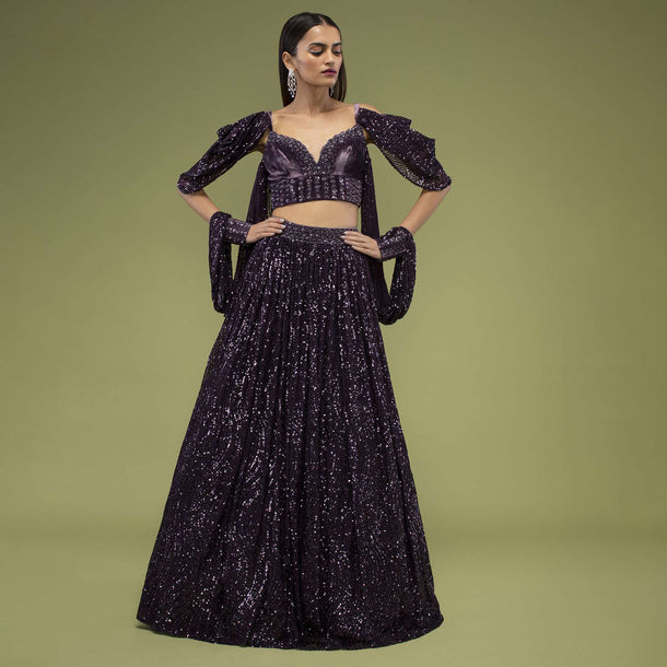 Plum Violet Lehenga And Crop Top In Velvet, Paired With A Cape Crafted In Net With Cuffs At The Border