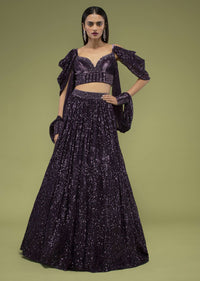 Plum Violet Lehenga And Crop Top In Velvet, Paired With A Cape Crafted In Net With Cuffs At The Border