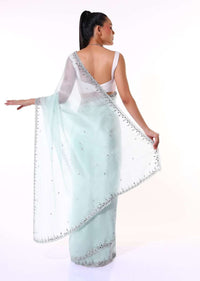 Powder Blue Saree In Organza With Mirror Embroidered Scallop Border Along With Cut Dana Accents Online - Kalki Fashion